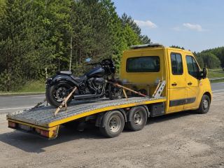 Transport motocykla na lawecie latem – Ostrołęka